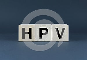 Cubes form the word HPV. The concept of HPV Human Papillomavirus in medicine