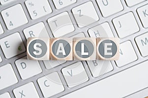 Cubes forming the word sale on a computer keyboard