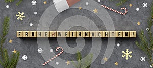 Cubes with German message for MERRY CHRISTMAS and christmas decoration