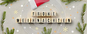 Cubes with German message for MERRY CHRISTMAS and christmas decoration