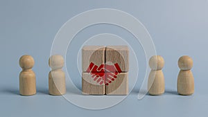 Cubes with handshake symbol. Business agreement between different parties. Business deal, cooperation, and partnership network.