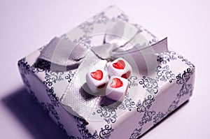 Cubes with hearts. The 14th of February. Hearts on white cubes. White background and cubes side view. White background
