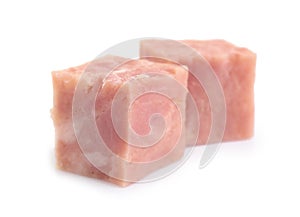 Cubes of tasty fresh ham isolated on white