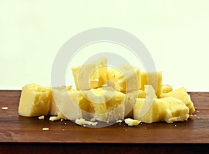 Cubes of white cheddar cheese.