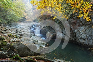 Cubo waterfall in autumn photo