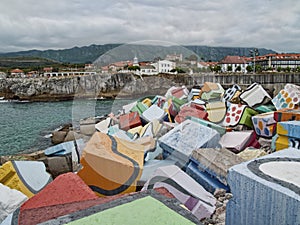 Cubos de la memoria in Llanes port photo