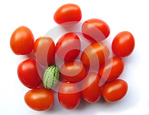 Cucamelon among cherry tomatoes photo