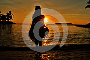 Cucoloris of a girl on the beach photo