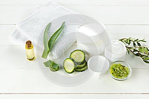 Cucumber and aloe cosmetic cream face, skin and body care hygiene moisture lotion photo