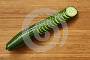 Cucumber on cutting board.