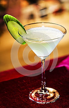 Cucumber and lime martini mixed cocktail drink glass