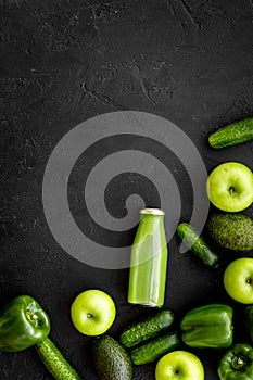 Cucumber, pepper, apple, celeriac. Vegetables for greeny organic smoothy for sport diet on dark background top view