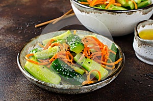 Cucumber salad with carrots and sesame seeds
