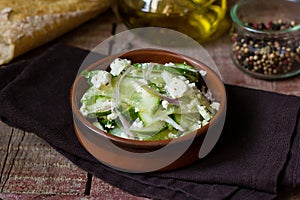 Cucumber salad with feta cheese, shallots, mint