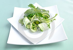 Cucumber salad with greens and sesame