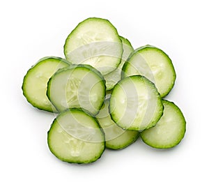 Cucumber slices isolated on white, from above
