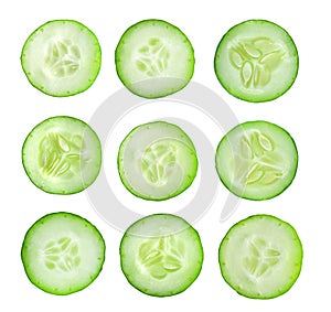 Cucumber slices isolated on white background. Top view