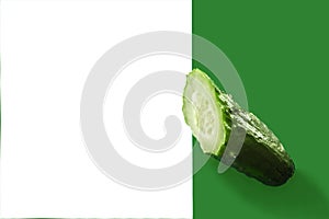 Cucumber slices on a white green background