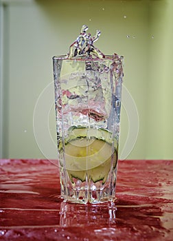 Cucumber splash glass water