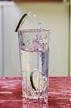 Cucumber splash glass water