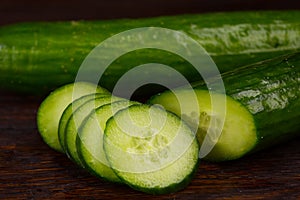 Cucumber on wooden background