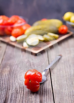 Cucumbers and tomatoes salty table