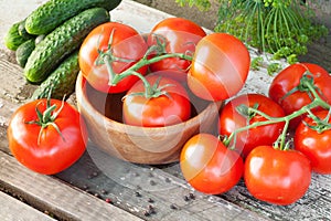 Cucumbers and tomatoes photo