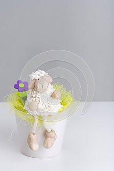 Cuddly woolly and flower and grass photo