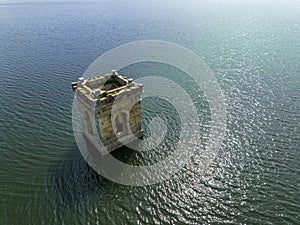 Cuerda del Pozo reservoir bell tower of the church of La Muedra Soria province photo