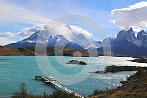 The Cuernos del Paine Horns of Paine and Lake Pehoe in Torres del Paine National Park photo