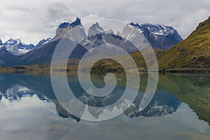 Cuernos del Paine reflecting in Lake Pehoe, Torres del Paine National Park, Chile