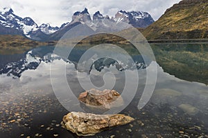 Cuernos del Paine reflecting in Lake Pehoe, Torres del Paine National Park, Chile