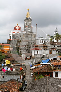 Church and houses in Cuetzalan town in puebla, mexico II photo