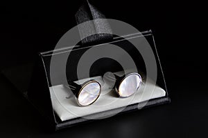 Cuff links on the black box