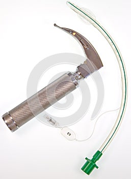 Cuffed endotracheal tube and laryngoscope photo