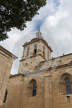 Detailed view at the iconic spanish Romanesque architecture tower building at the Cuidad Rodrigo cathedral photo