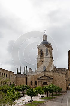 Majestic front view at the iconic spanish Romanesque architecture building at the Catedral Santa MarÃÂ­a de Ciudad Rodrigo towers photo