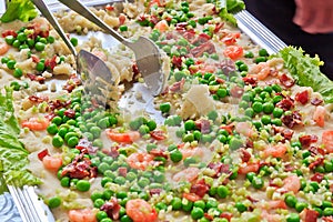 Cuisine with green peas and shrimps