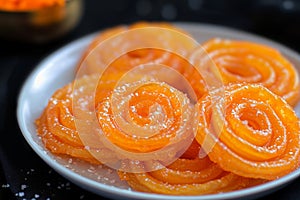 Culinary artistry Jalebi, an Indian sweet food with swirling elegance