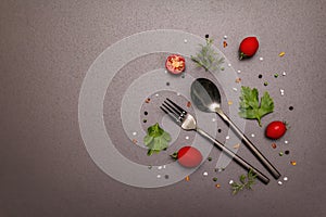 Culinary background. Cooking food concept. Cutlery, fresh vegetables, spices, herbs