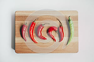 Culinary background with fresh vegetables on cutting board