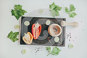 Culinary background with fresh vegetables on cutting board