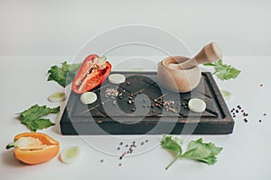 Culinary background with fresh vegetables on cutting board