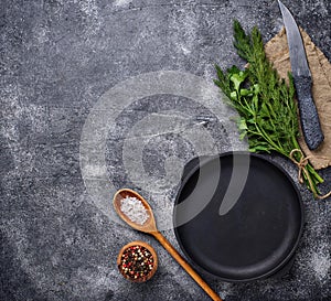 Culinary background with spices, pan and knife