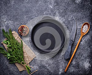 Culinary background with spices, pan and knife