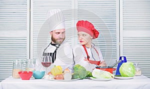 Culinary battle concept. Woman and bearded man culinary show competitors. Who cook better. Ultimate cooking challenge