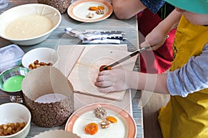 Culinary class for children and parents - cooking Easter cake, on the table lie the ingredients and tools for work.