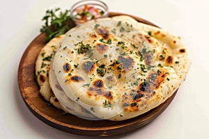 Culinary delight Naan, an isolated serving of delectable Indian bread