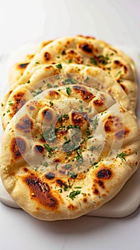 Culinary delight Naan, an isolated serving of delectable Indian bread