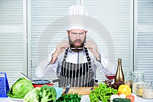 Culinary is exciting. Chef handsome hipster. Get ready. Man bearded chef getting ready cooking delicious dish. Chef at